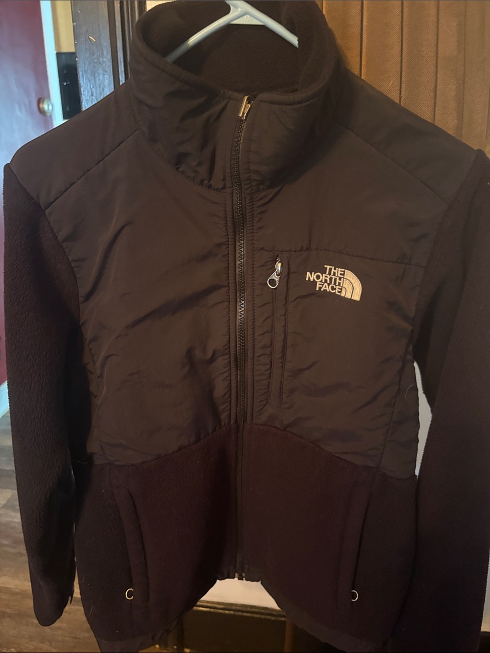 The North Face Women's Black thick fleece jacket with adjustable bottom